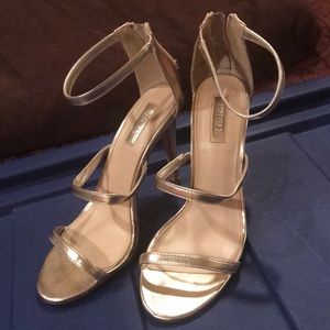 Open toe gold heels